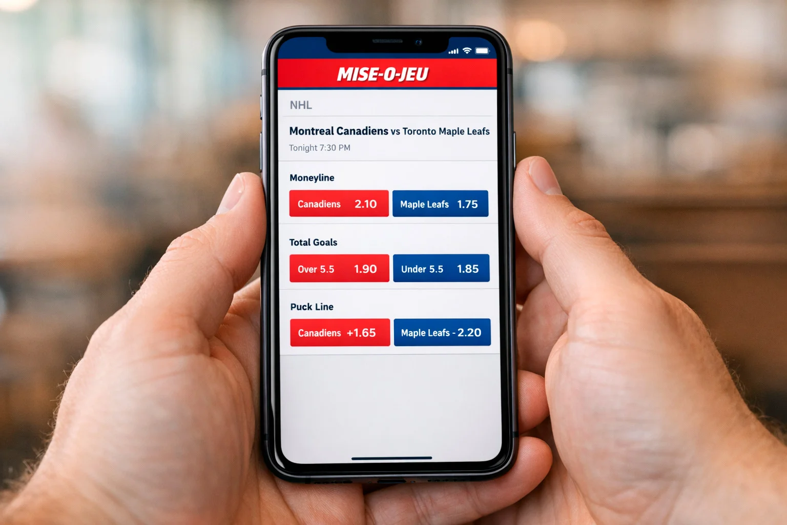 Smartphone displaying Mise-o-jeu sports betting app with hockey game odds